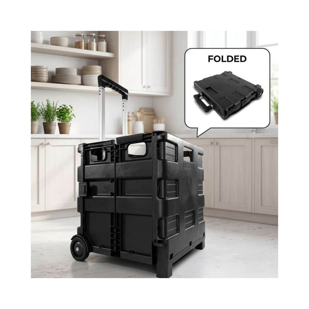Carrinho dobrável multiuso reforçado na cor preta, com alça estendida, posicionado no chão de uma cozinha clara e moderna estilo Pinterest. No canto superior direito, um balão de destaque mostra o detalhe do carrinho completamente fechado e compacto com a palavra 'Folded'